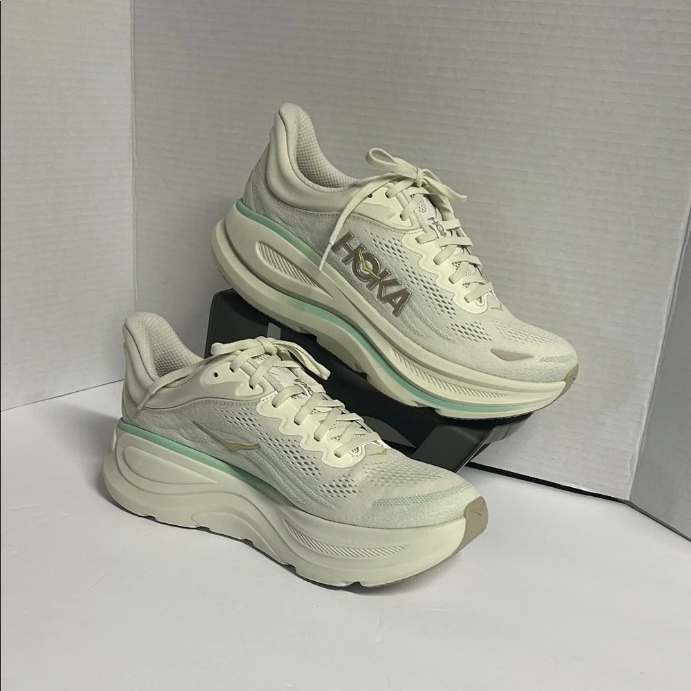 Hoka Off-White and Light Green Athletic Shoes